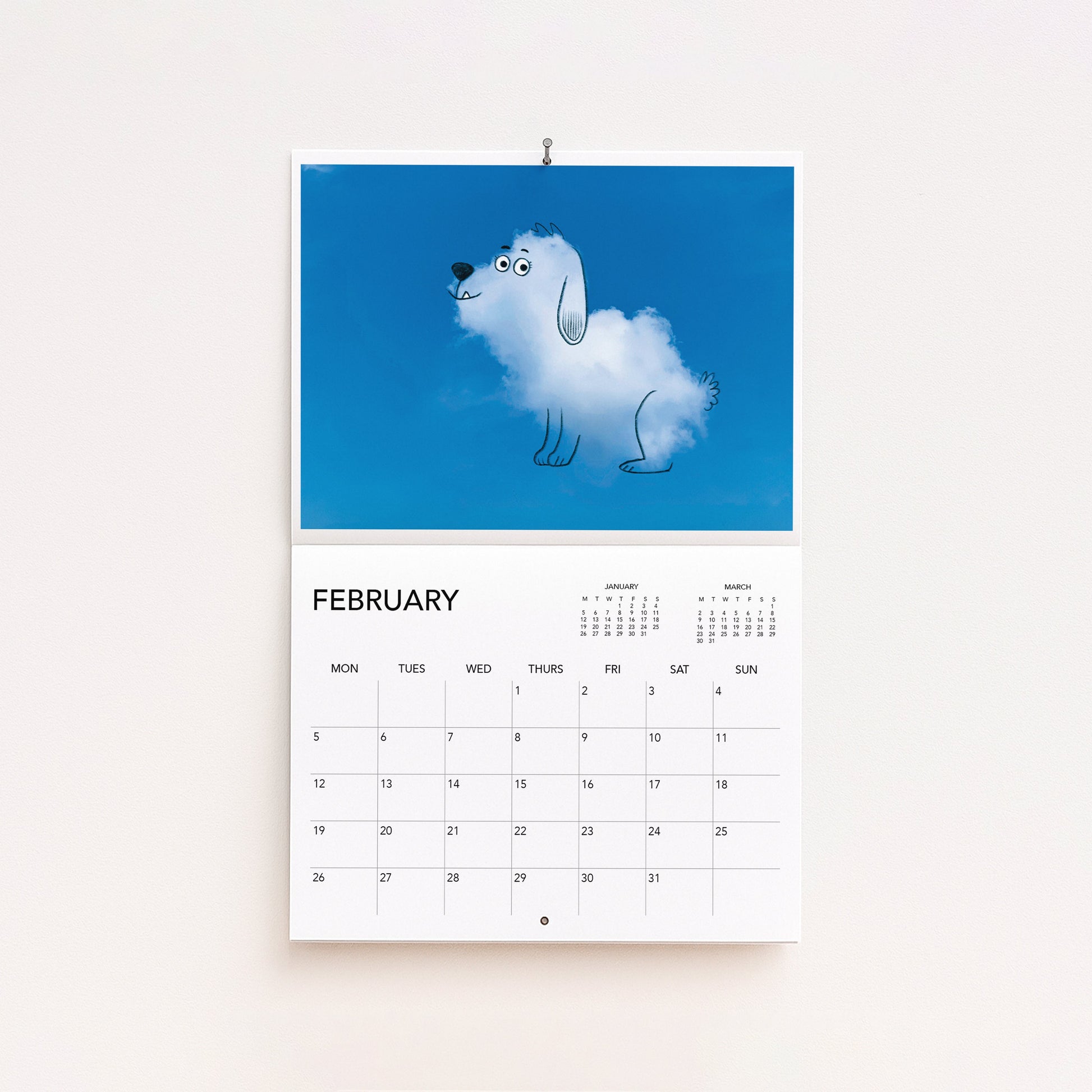 Calendar with a cartoon dog on a cloud for February on a white background