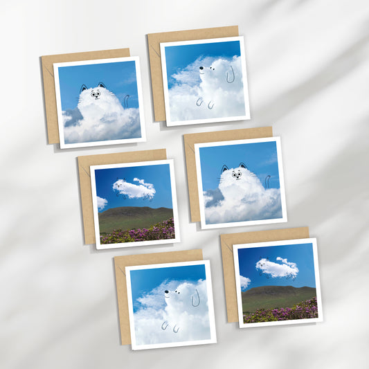Set of six greeting cards with cloud-themed designs on a white background
